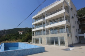 Apartments in a complex with a swimming pool and sea views in Dobra Voda