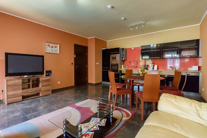Two-bedroom apartment in complex with a swimming pool in Dobrota